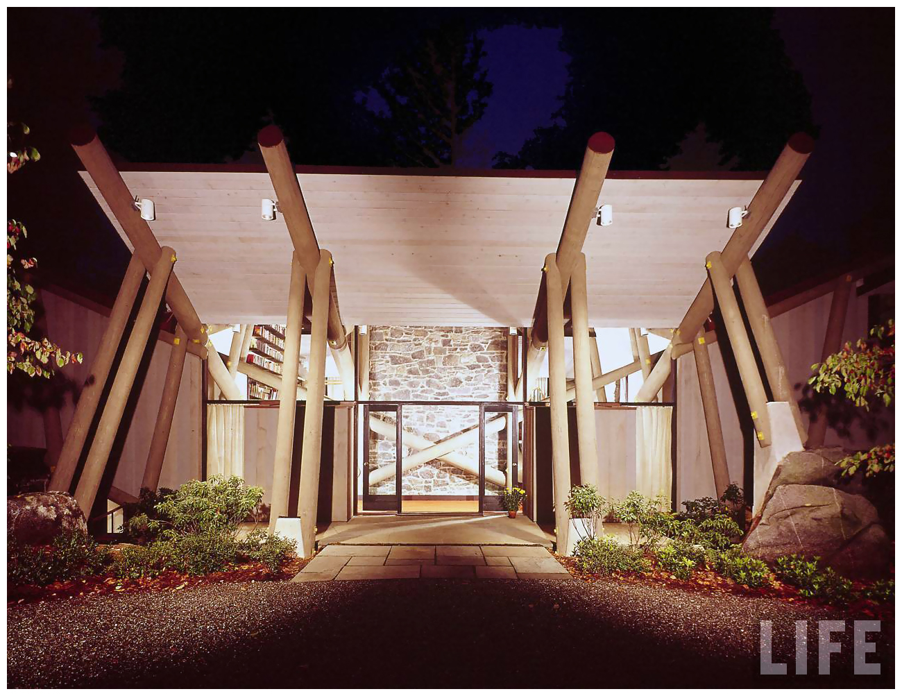  - photo-john-dominis-home-of-mr-and-mrs-chase-ritts-designed-by-john-johansen-here-is-the-main-entrance-whose-roof-is-supported-by-wooden-telephone-poles